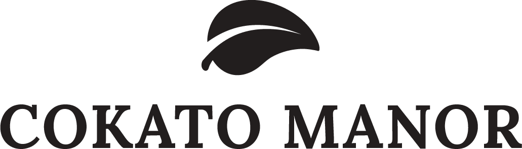 black cokato manor logo