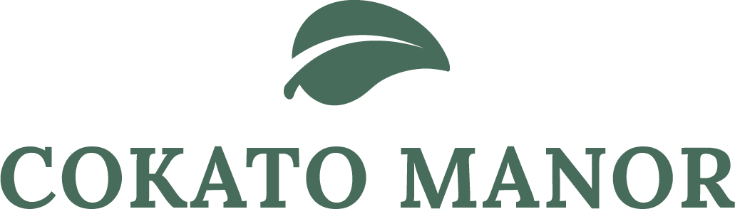 Green cokato manor logo