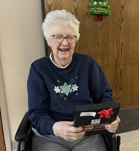 elder receiving a gift