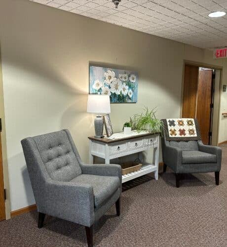 hallway with chairs at edgewood gables