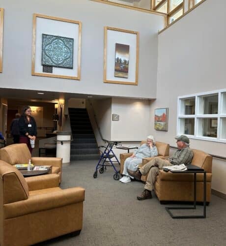 residents at entry way in brookridge assisted living