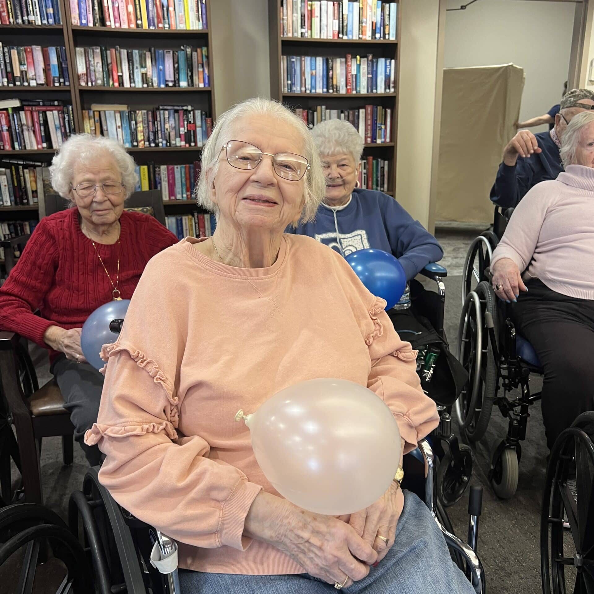 group of elders sitting in the library