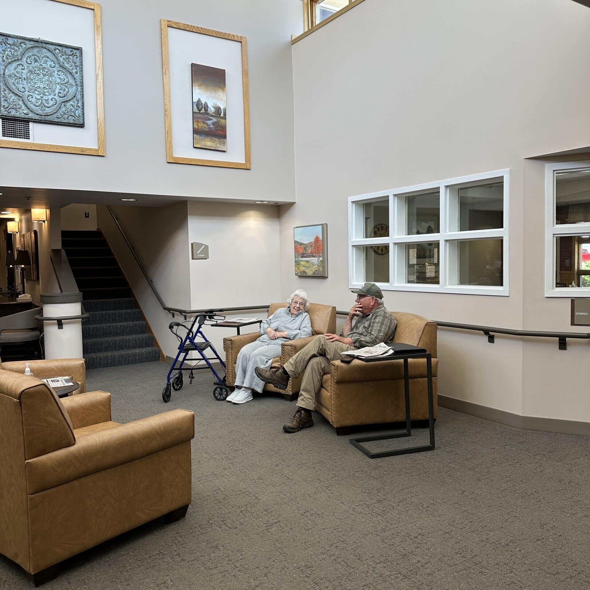 residents chatting on couch at brookridge