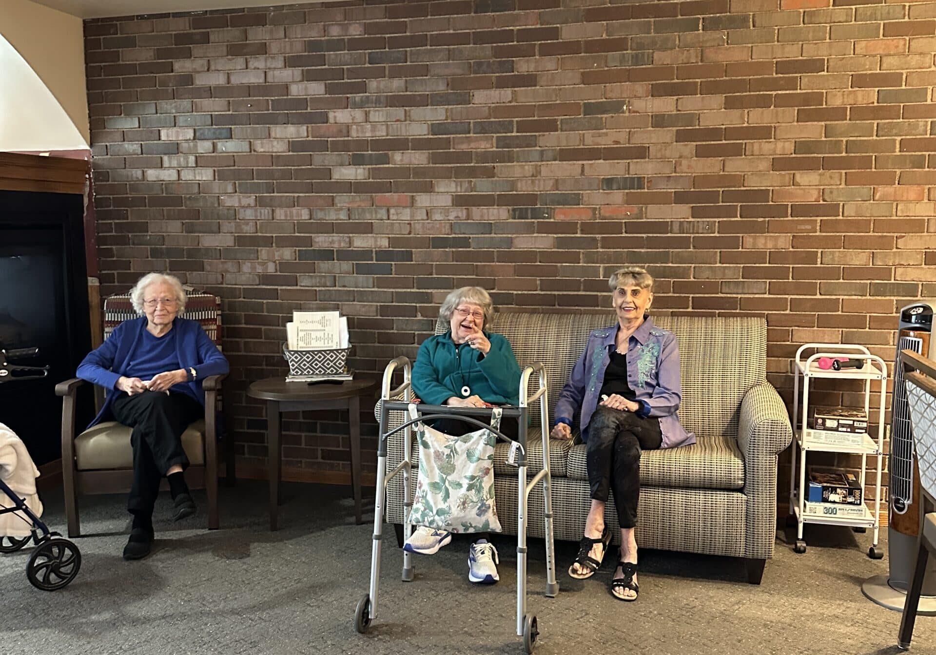 residents sitting in commons at brookridge assisted living